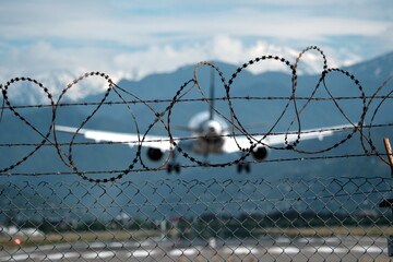 landing plane and barbed wire fence