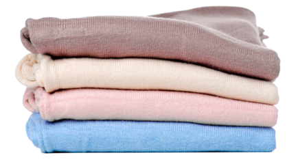 Stack folded sweaters on white background isolation