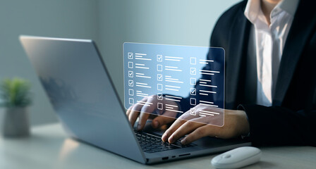 Businessman in laptop doing online data checklist survey. Productivity checklist and filling survey...