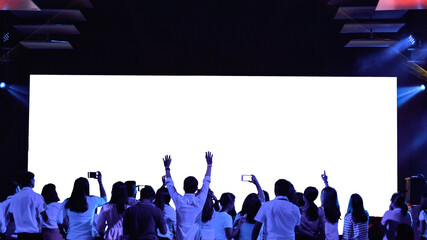 Front view of mockup on big blank white screen with space in empty huge hall with enjoy and happy...