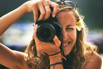 Camera, photographer and woman on holiday outdoor, travel or summer vacation in Australia. Dslr...
