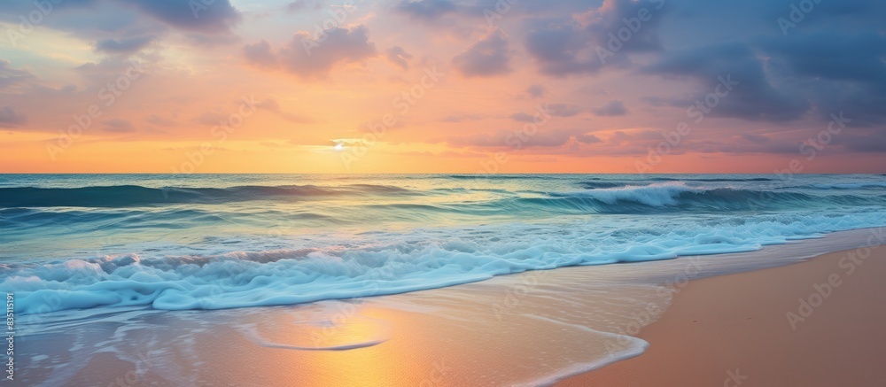 Poster a breathtaking image of a serene beach at sunset with ocean waves, offering a peaceful paradise vibe