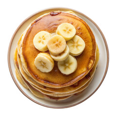 A close up image of a stack of golden brown pancakes topped with fresh banana slices