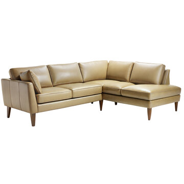 recommend clip art: Stylish beige leather sectional sofa shown on a transparent background, perfect for contemporary interior design schemes