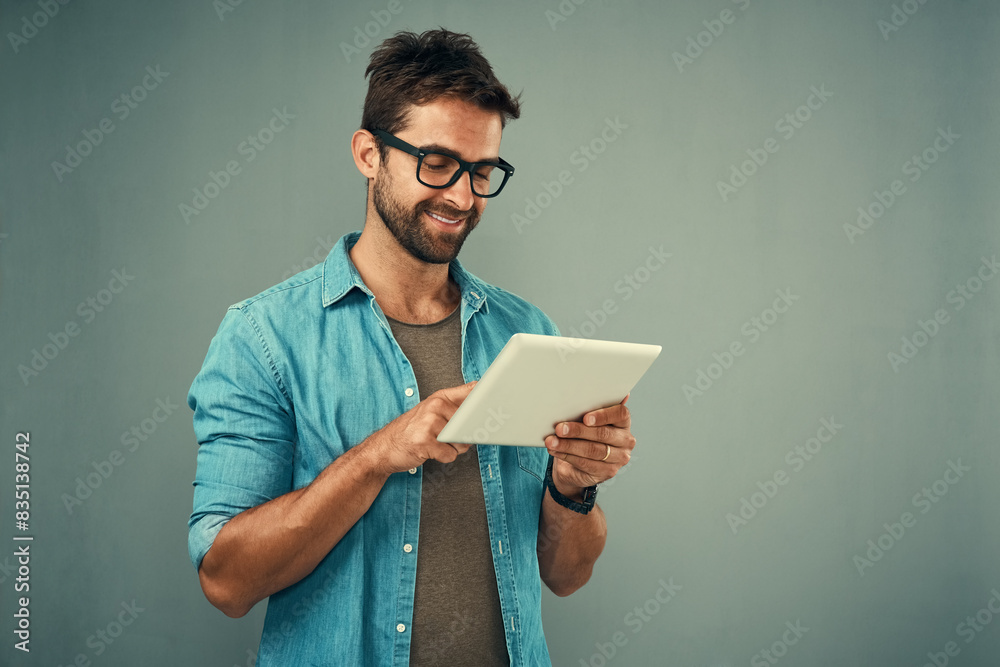 Poster man, scroll and tablet by white background with smile for social media, internet or website search. 
