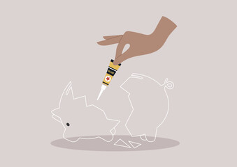 A hand holds a tube of glue, preparing to mend a broken piggy bank