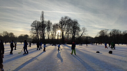 ice skating on a frozen lake in Munich during cold and icy winter days