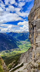 Alps lake reflecting snow covered Zugspitze mountain in spring 
