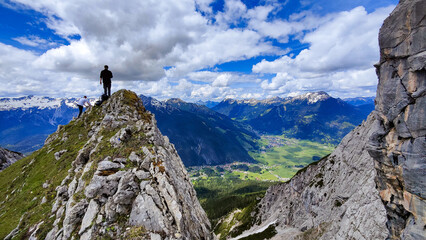 Alps lake reflecting snow covered Zugspitze mountain in spring 