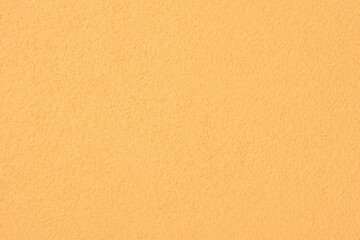 Yellow cement wall texture for background.