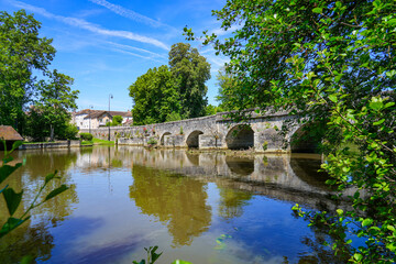 Old medieval stone bridge of Grez-sur-Loing, spanning the river Loing in the French department of...