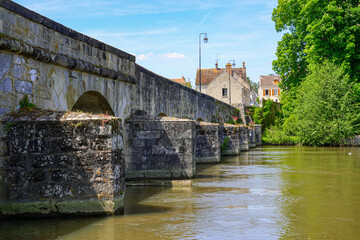 Old medieval stone bridge of Grez-sur-Loing, spanning the river Loing in the French department of...