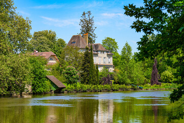 Luxury mansion on the banks of the river Loing in Grez-sur-Loing in the French department of Seine...