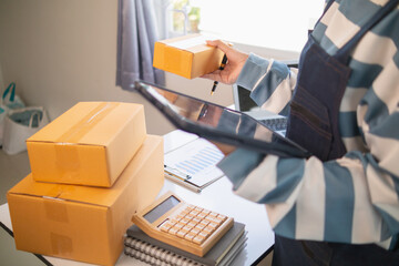 SME entrepreneurs prepare packages and verify customer information deliver products according...