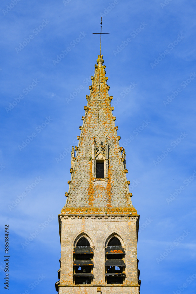 Wall mural Bell tower of the abbey church of Ferrière-en-Gâtinais in the French department of Loiret, Centre Val de Loire, France