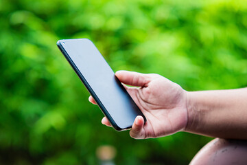 Someone is playing on a smartphone