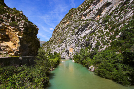 Verdon river with its turquoise waters near Castellane, at the bottom of the ravine of the Verdon Gorge in the southern Alps, France