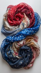 Naklejka premium Colorful scarves with star and floral patterns arranged in intricate swirls on a white background.