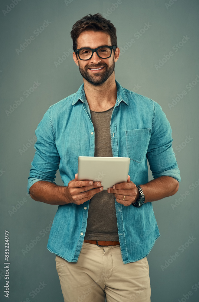 Poster man, studio and portrait with tablet and glasses, career with software programming in london. male c