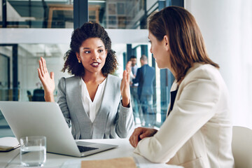 Laptop, talking and business women in office for discussion, meeting and consulting for online...