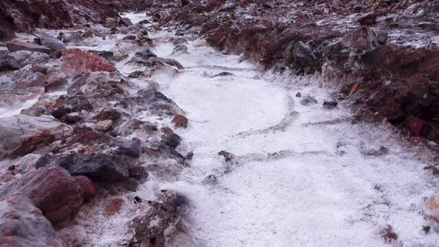 Gypsum stream after rare raine, dropped, supersaturated solutions, chemical sediment, Mountains of volcanic origin. Hormuz Island, Iran