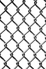 Fototapeta premium A black and white image of a chain link fence, suitable for use in scenes where a urban or industrial background is needed