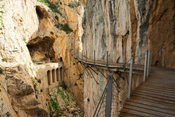 Caminito Del Rey (Royal Trail or The King's Little Path)) is a mountain path along steep cliffs in Gorge Chorro, Andalusia, Spain. Walkway pinned along the steep walls of a narrow gorge.