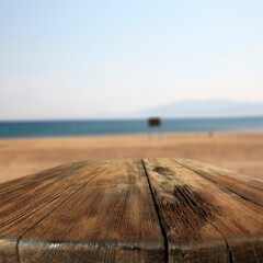 Desk of free space and summer ladnscape of beach and sea. 