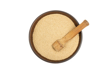 Amaranth grains in a bowl and a wooden masher on them