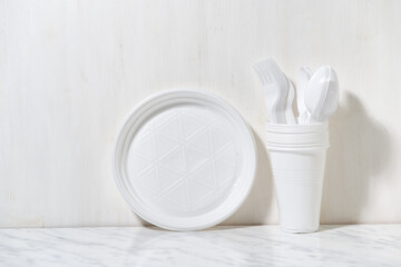 plastic disposable tableware on white background
