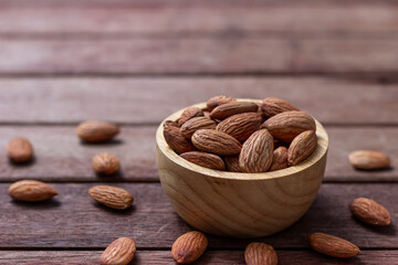 Almond snack fruit in wooden bowl