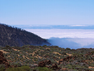 Spectacular mountain view above the clouds from the mirador in Teide Volcano National Park,...