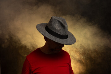 Bearded man wearing hat and posing for photo. portrait in studio.