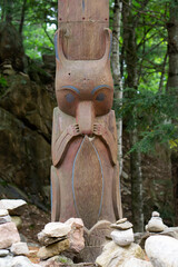 Wooden indigenous totems at the park. Animal totems.