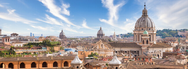 Rome, Italy. Urban landscape, blue sky with clouds, church exterior architecture