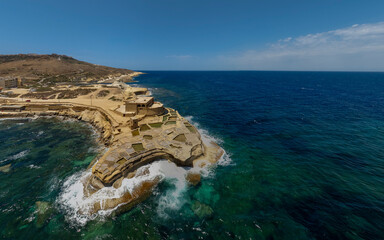 Famous touristic attraction in Gozo island the Salt Pans in  Xwejni Bay, Xwejni, Gozo island a part of the Malta islands.