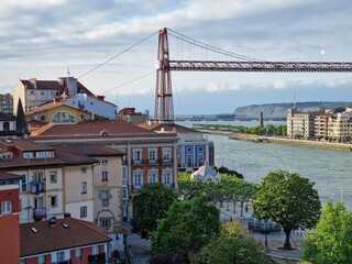 View of Portugalete transporter bridge (Vizcaya bridge) connecting Getxo and Portugalete in Spanish Basque Country (Pais Vasco, Spain)