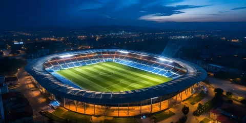 Papier peint photo  Aerial View of Soccer Stadium at Night During Live Championship Match Broadcast. Concept Sports Photography, Soccer Stadium, Night view, Aerial Shot, Championship Match  © Anastasiia
