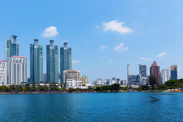 Fototapeta premium Tall structures in a large metropolis Large metropolis by day, panoramic picture of the city