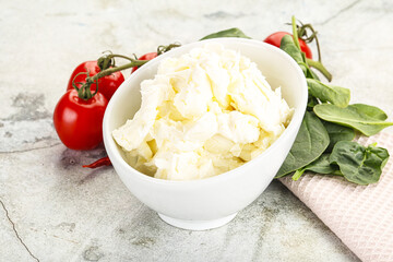 Soft cream cheese in the bowl