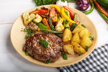 Roasted beef steak with potato