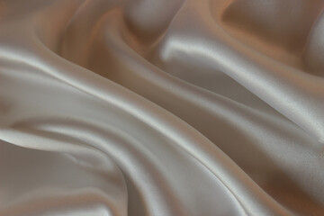 Draped ivory silk fabric background