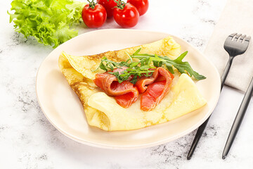 Russian pancake with salmon fish
