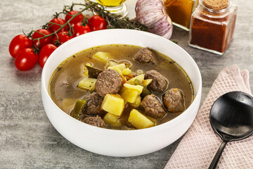 Soup with meatball and potato