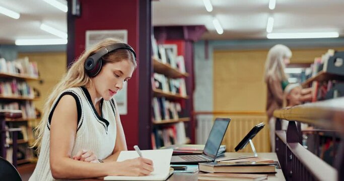 Girl, headphone and singing in library, music and noise for people, loud and streaming on app. University student, happy and listening to audio to study, notebook and writing with sound for project