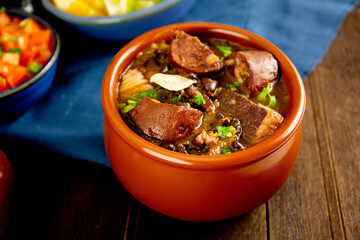 Brazilian Feijoada Food black bean stew with bacon and pork sausage
