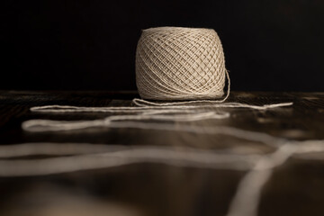 a spool of light thread for sewing