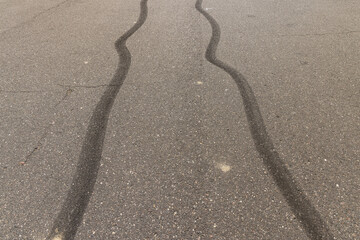 tire tracks during dangerous driving on the road