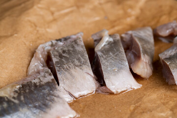 salted herring fillet on the table