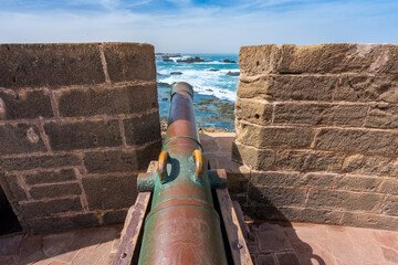 A row of historic cannons overlook the sea on the fortifications of Essaouira, Morocco, a UNESCO...